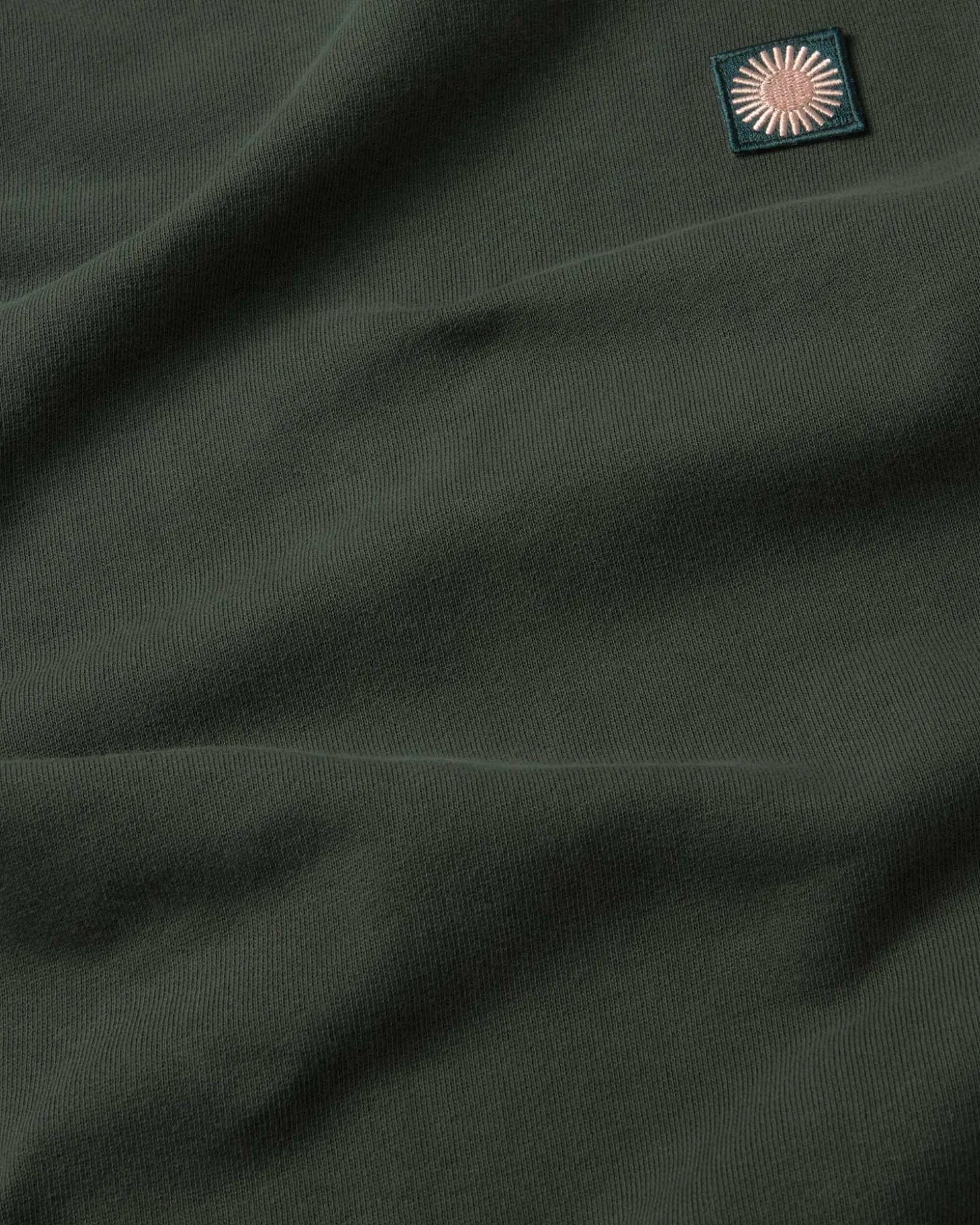Sweat vert Leon soleil coral au dos